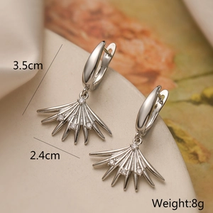 Macro detail of silver bow drop earrings with cubic zirconia and 3.5cm length dimensions