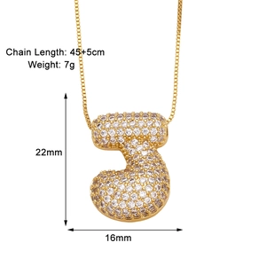 Detailed view of the gold-plated letter J pendant with zircon stones and dimensions