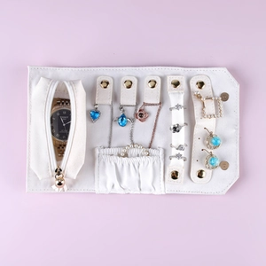 White foldable PU jewelry travel roll organizer with multiple storage compartments