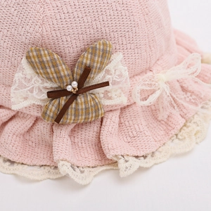 Pink knitted baby sun hat with cute lace trim and plaid bow detail for infants