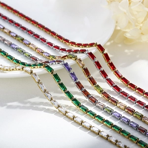 Vintage gold and silver tennis necklaces with multi-color rectangular-cut zircon stones