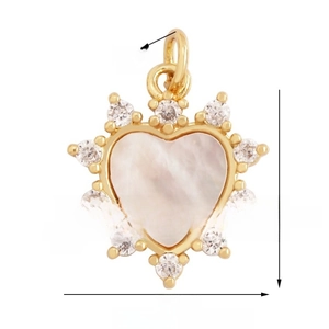 Macro shot of 15mm heart pendant with white shell inlay and zircon border detail