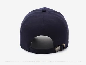 Rear view of navy blue baseball cap showing fabric texture and adjustable metal buckle