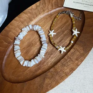 Bohemian two-piece shell bracelet set with square shell beads and white starfish charms
