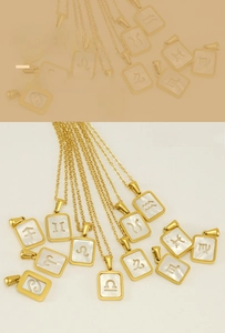 Détail de 12 pendentifs zodiaque avec placage or 18K et incrustation nacre blanche