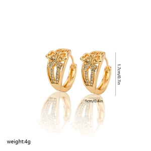 Detail view of gold butterfly hoop earrings with white zircon inlays and dimensions