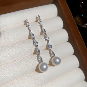 Elegant silver drop earrings with marquise zircon stones and white round pearls