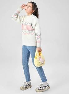 Detail view of cute yellow plush unicorn handbag with embroidery for little girls