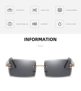 Detail of rimless rectangular sunglasses featuring grey lenses and gold metal bridge