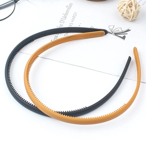 Matte finish non-slip headbands with teeth in black and ginger yellow colors