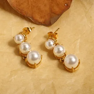 Elegant long triple pearl drop earrings with gold-plated claw settings for women