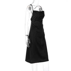 Detail of black satin midi dress featuring spaghetti straps and draped cowl neckline