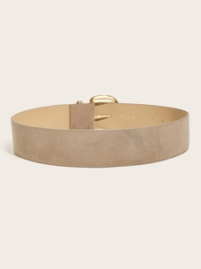 Detail view of wide suede leather belt with semi-circular gold metal buckle
