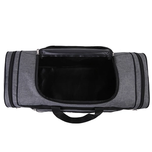 Grey quilted gym bag with open zipper showing spacious black interior on white background
