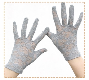 Close-up of grey long floral lace gloves with sheer mesh texture and elegant embroidery