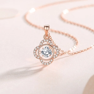 Elegant rose gold S925 silver four-leaf clover necklace with dancing moissanite pendant