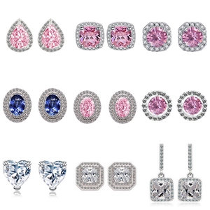 Pink and blue zircon halo stud earrings set in various teardrop and heart shapes