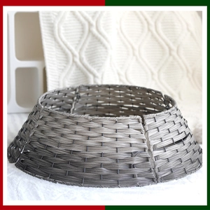 Detail of grey hand-woven wicker Christmas tree collar with a modern gradient finish