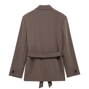 Rear view of brown blazer featuring a tied waist belt and button cuffs on pure white backdrop