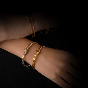 Polished stainless steel twist knot bracelet set for women in gold and silver finish