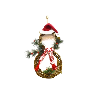 Detailed close-up of a snowman-shaped Christmas wreath made of vine with festive decor