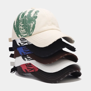 Graffiti printed baseball caps with distressed fabric and VIBRATE logo in five colors
