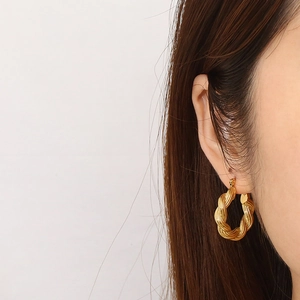 French vintage gold twisted hoop earrings made of stainless steel for a retro style