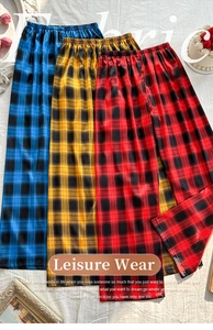 Detailed view of elastic waist on three classic plaid imitation silk lounge pajama pants