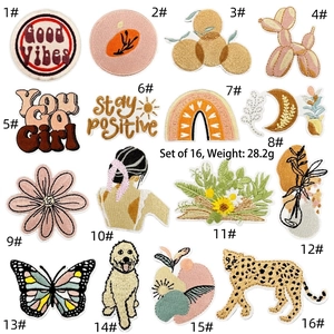 Set of 16 embroidered iron-on patches with floral and modern motifs, weighing 28.2g