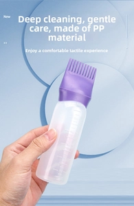 Detail of 6oz hair dye applicator bottle with purple comb nozzle and clear scale markings