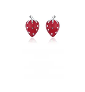 Detailed close-up of S925 sterling silver strawberry earrings with red enamel finish