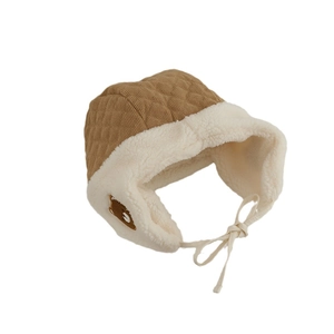 Quilted baby winter aviator hat with bear patch and warm lamb wool lining in brown