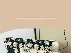 Detail of embroidered daisy cosmetic bag with high-quality knitted floral texture