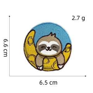 Cartoon sloth on moon embroidery patch with 6.6cm height and 6.5cm width dimensions