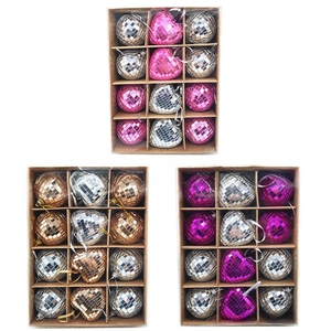 Detailed set of disco ball and heart-shaped ornaments in 12-grid storage box