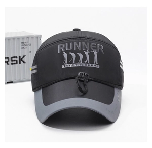 Detail view of quick-dry fishing hat with reflective strips and Runner embroidery