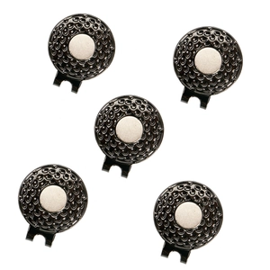 Black and silver golf ball markers with magnetic hat clips on white background