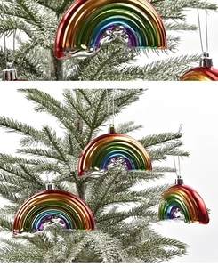 Rainbow Christmas hanging ornament with glossy electroplated finish on green festive tree
