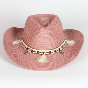 Pink woven straw cowboy hat featuring bohemian shell decorations and tassel band details
