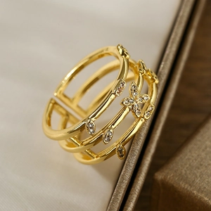Elegant gold-plated geometric multi-layer ring with hollow flowers and zircon stones