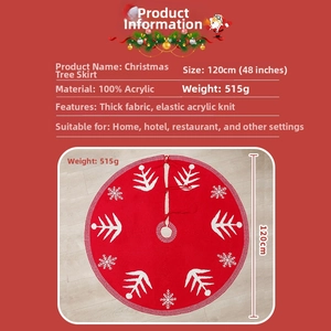 Detail of red knitted Christmas tree skirt with white snowflake patterns, 120cm diameter