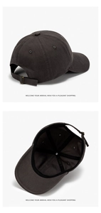 Detail view of cotton baseball cap with adjustable metal buckle and inner stitching