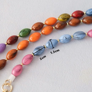 Chaîne de perles acryliques colorées avec perles dorées et fermoirs métalliques