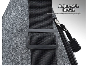 Detail of adjustable strap buckle and durable grey textured fabric on the sports bag