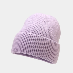 Detailed view of light purple ribbed knit beanie with thick wool texture and folded cuff