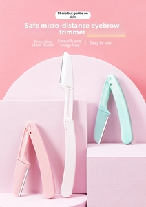Close-up of safety folding eyebrow razors with micro-guard blades in three pastel colors