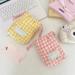 Bolsas acolchadas de cuadros para cámara en amarillo y rosa para viajes y fotos