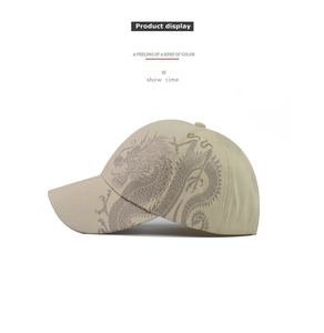 Detailed side view of beige cotton baseball cap featuring exquisite grey dragon print embroidery