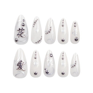 White translucent stiletto press-on nails with silver star and character decorations