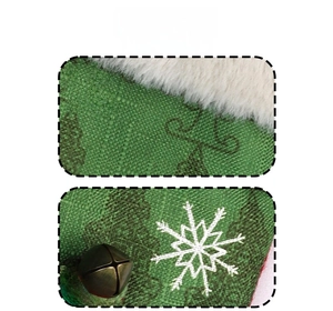 Detail of burlap Christmas stocking with snowflake embroidery and bronze bell